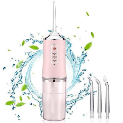 Іригатор для чищення зубів та порожнини рота Oral Irrigator з акумулятором та змінними насадками. Колір: рожевий 